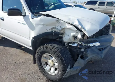 1999 Toyota Tacoma из США, поврежденный, VIN 4TAWN72N6XZ421378